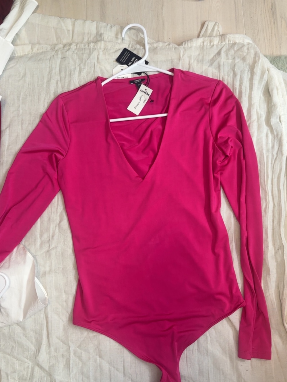 Express Long Sleeve V-Neck Bodysuit in Bright Pink